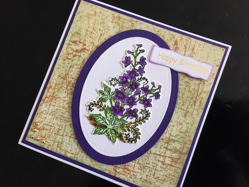Hand made birthday card with stamped and die cut larkspur flowers