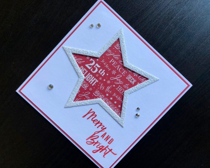 Christmas card with die cut glitter star frame