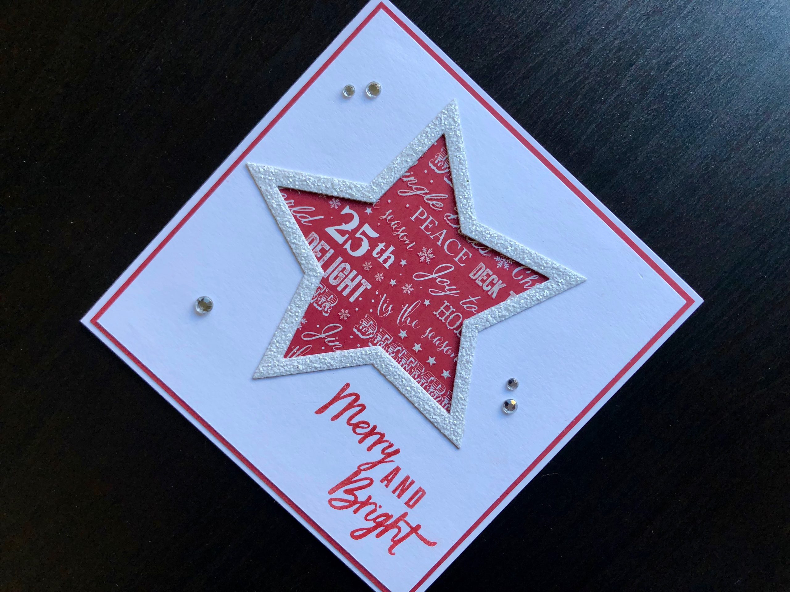 Christmas card with die cut glitter star frame