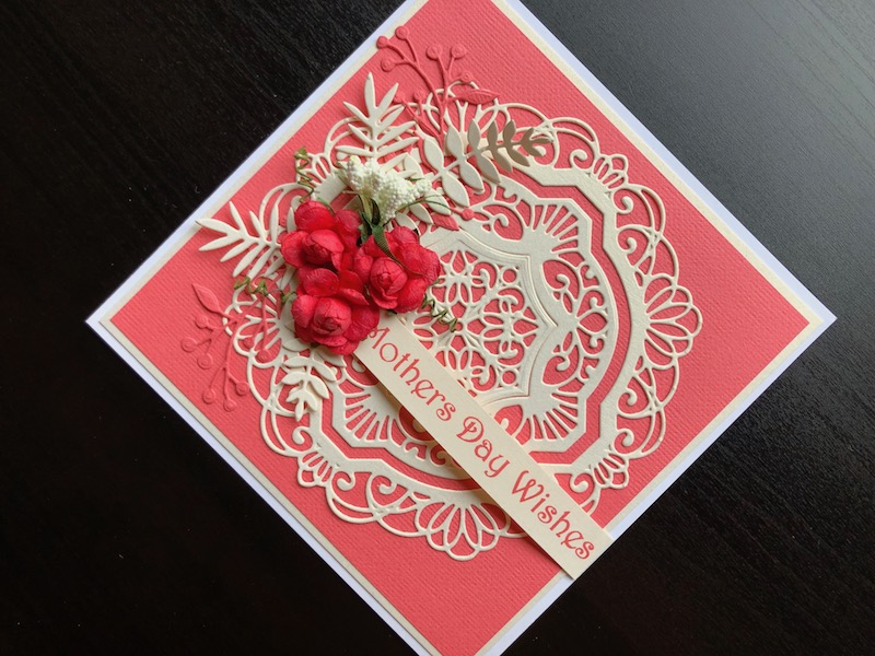 Hand made mothers day card with die cut doily and flower corsage
