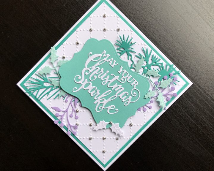 Christmas card with die cut sentiment and foliage