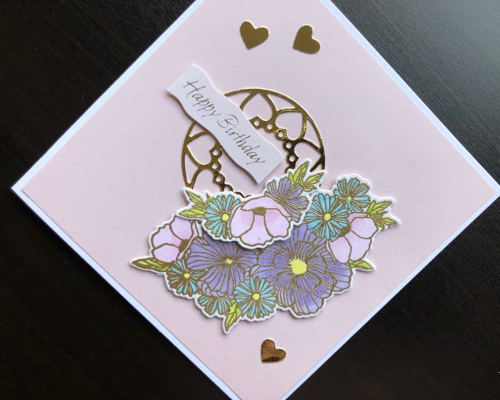 Hand made birthday card with stamped and die cut flowers