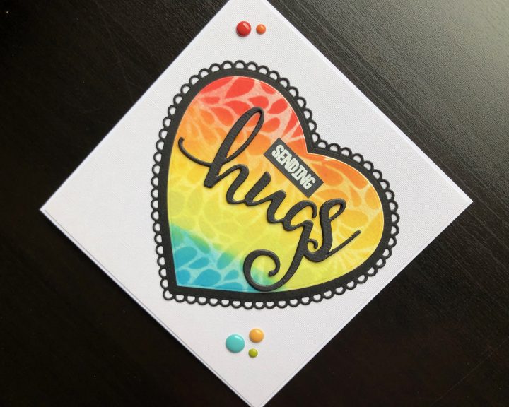 Hand made Hugs card with stencilled heart