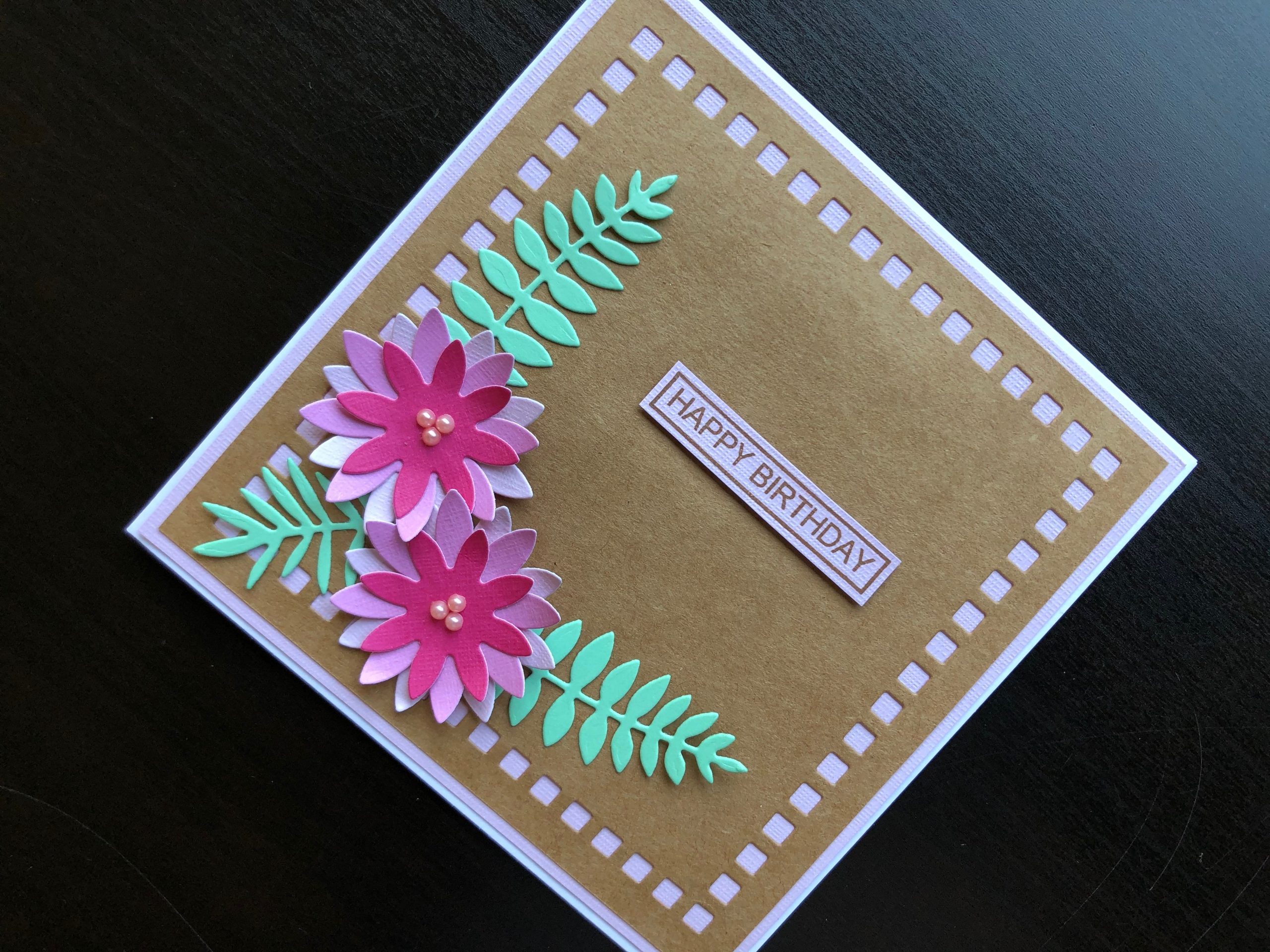 hand made birthday card with die cut flowers and leaves