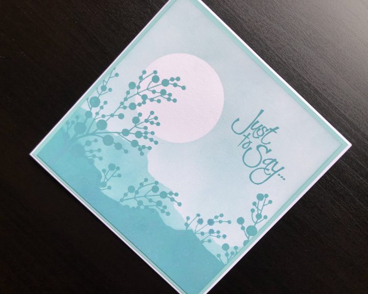 hand made card with monochrome inking, masking and silhouette stamping
