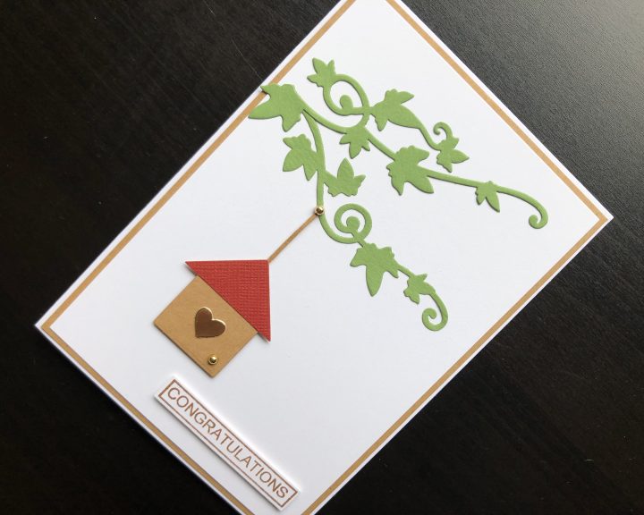hand made new home card with die cut bird house and stamped congratulations message