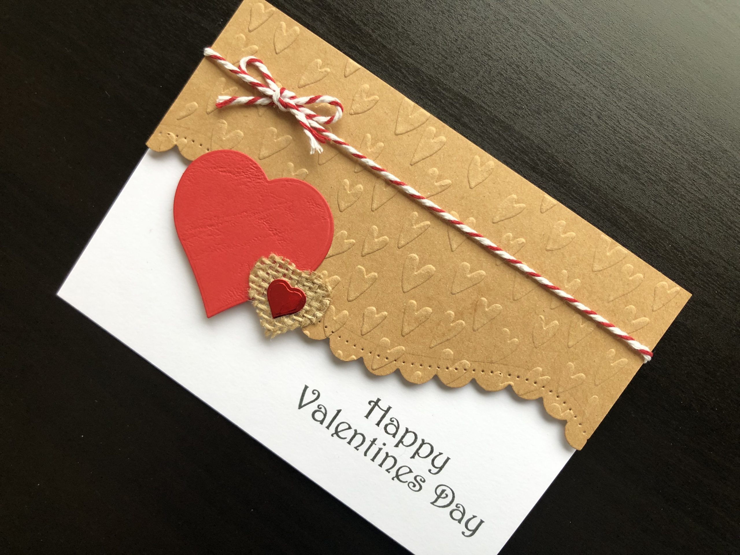 Hand made Valentine card with embossed and die cut hearts