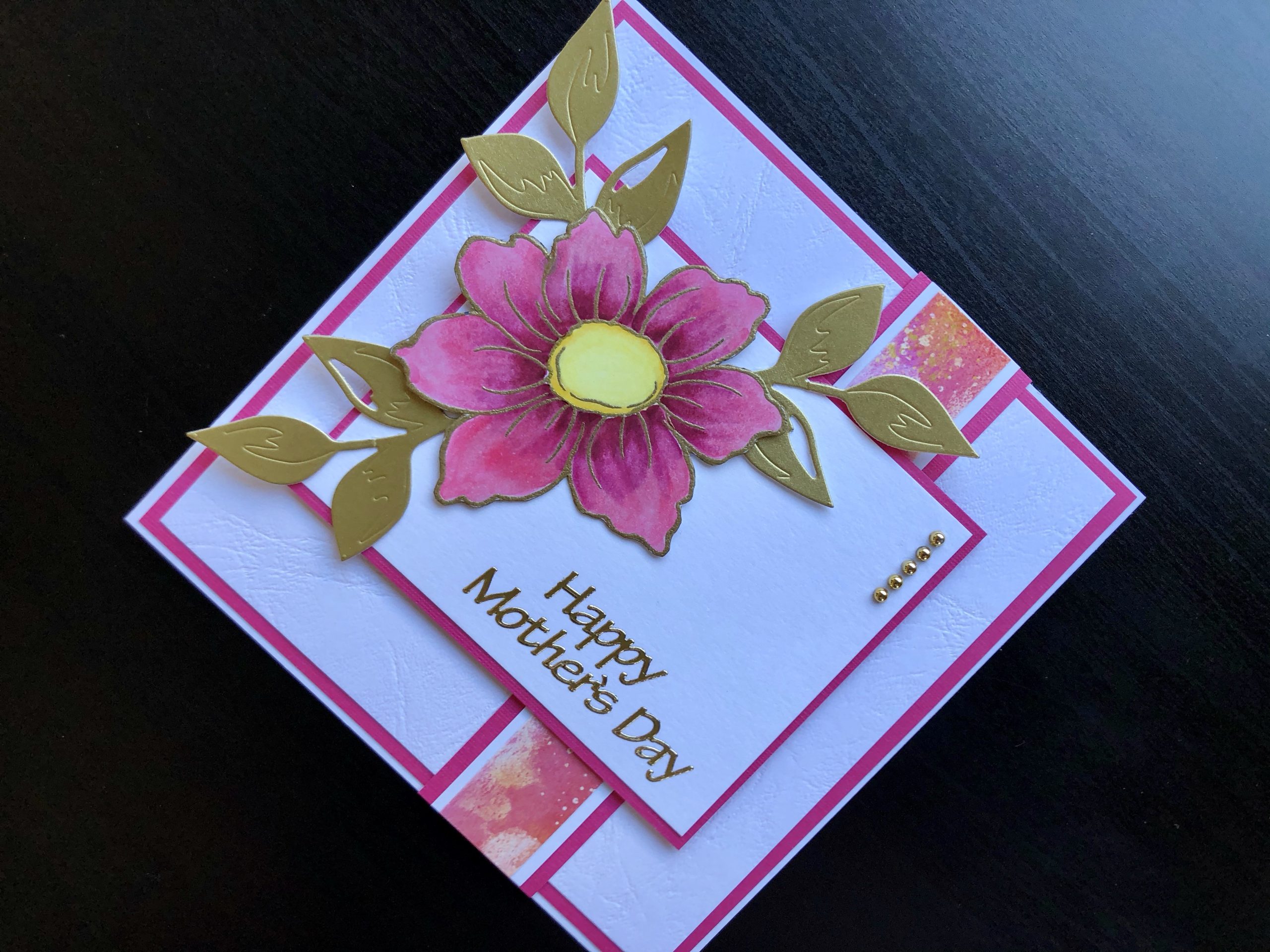 Hand made Mothers Day card with pink stamped dog rose and gold leaves