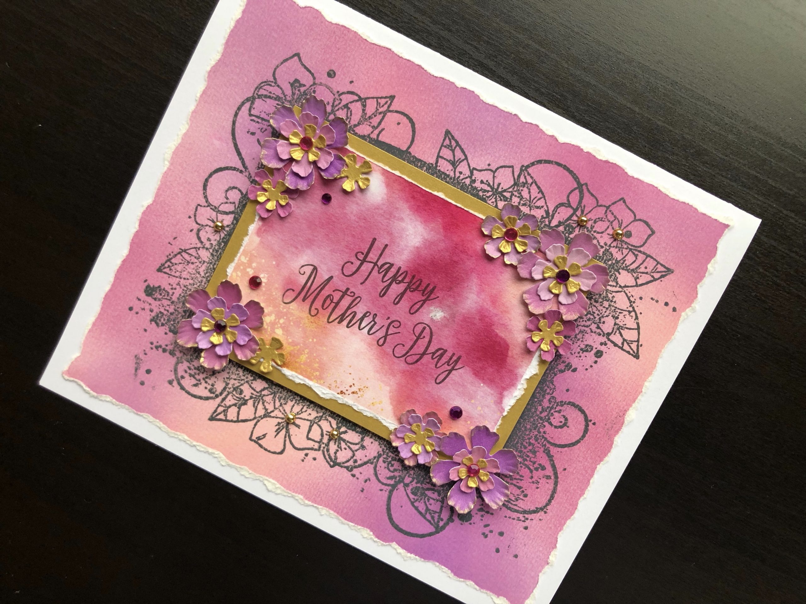 Hand made Mothers Day card with inked background and die cut flowers