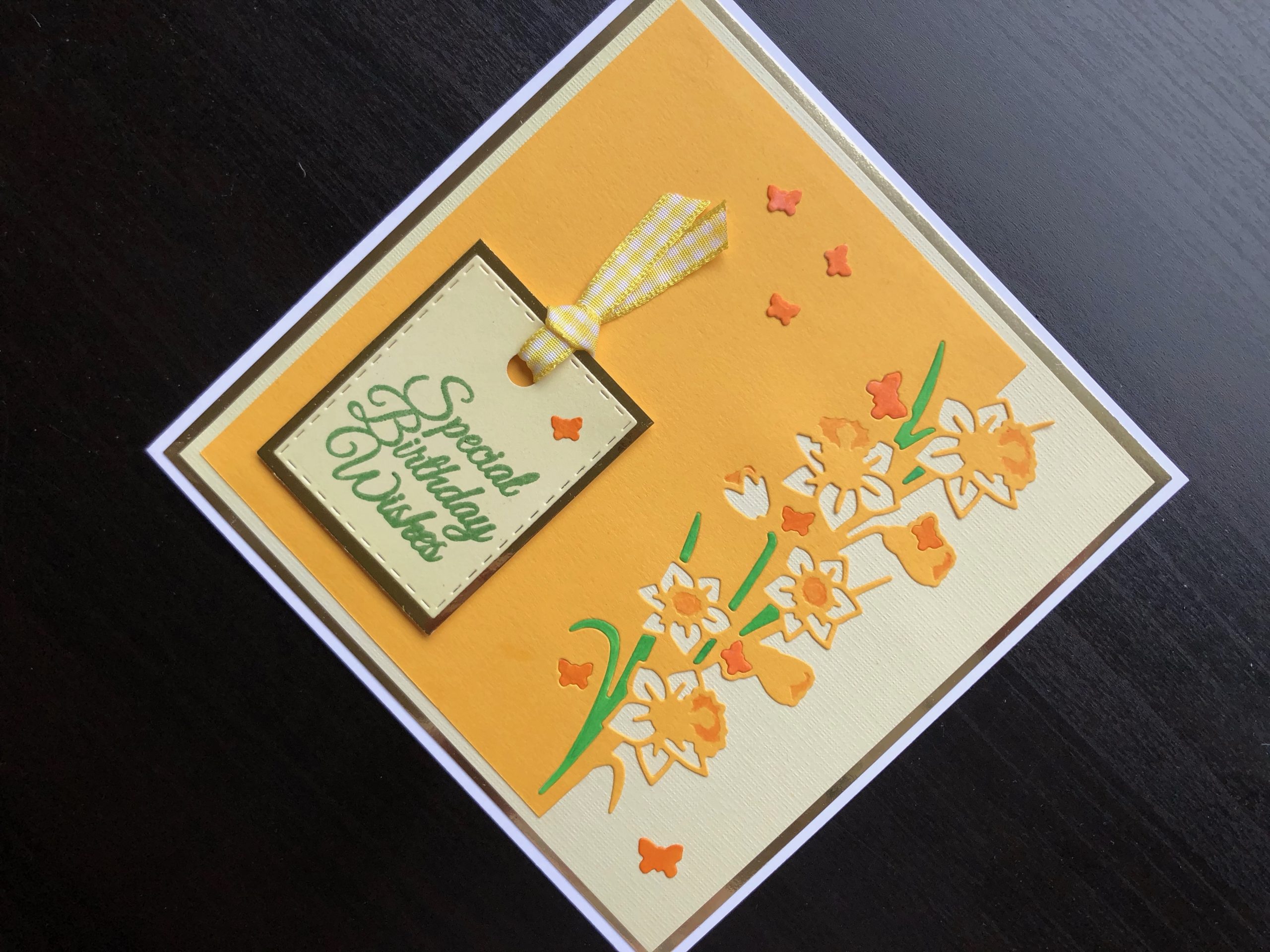 Hand made spring birthday card with die cut daffodil border