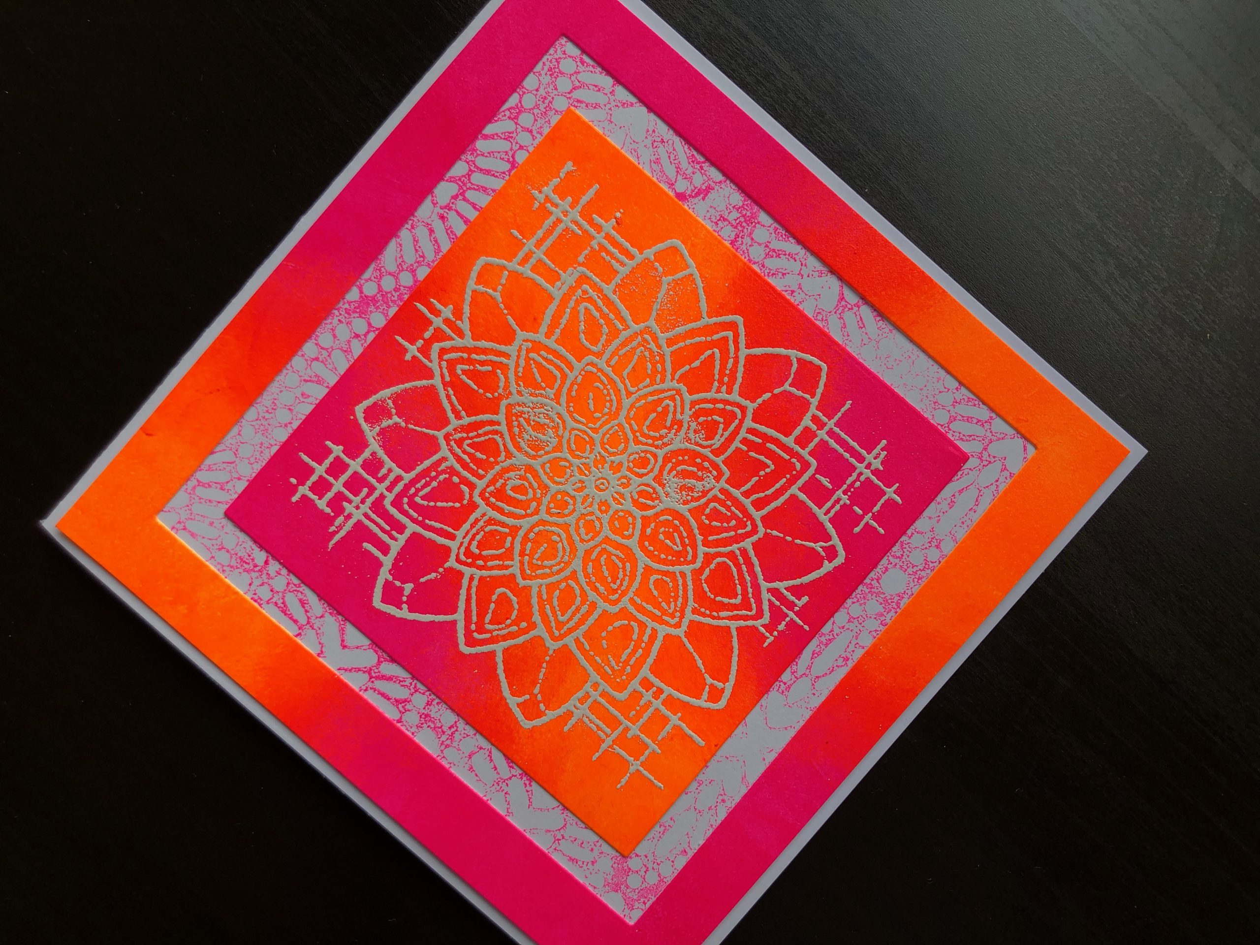 Hand made card with Neon Polish and stamped, heat embossed Blossom