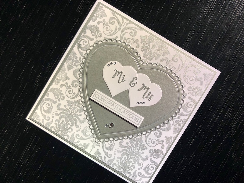 Hand made wedding card with stamped background, die cut hearts and Mr & Mrs