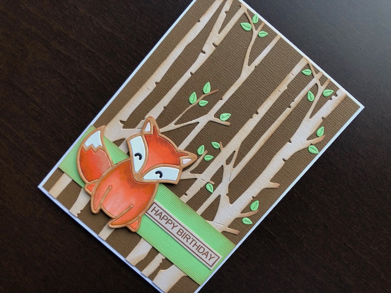 Hand made birthday card with die cut fox and forest background