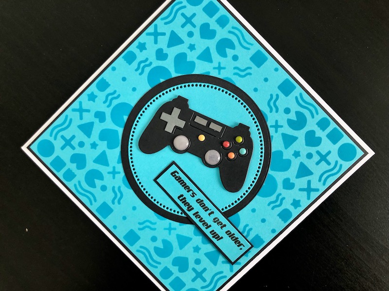 Hand made birthday card with stencilled background and die cut computer game controller.