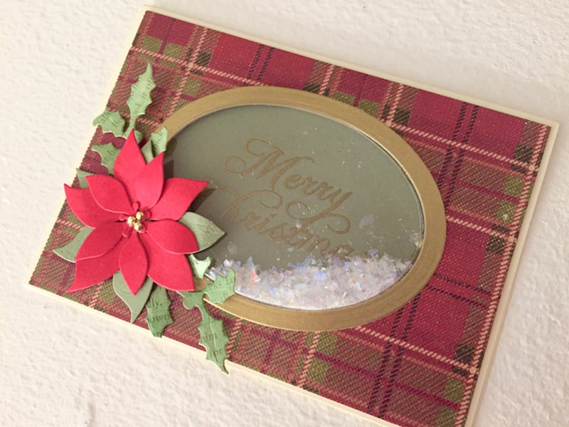 Hand made Christmas card with oval shaker window