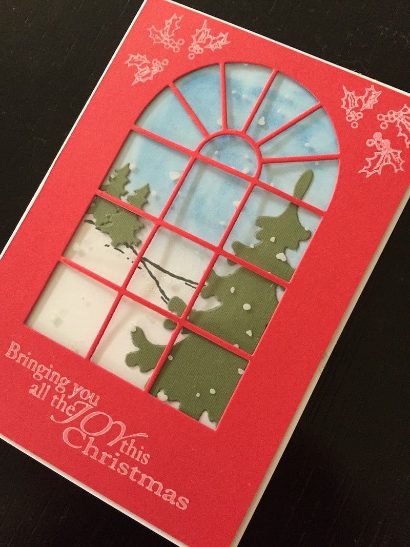 Christmas card with die cut window and snowfall acetate